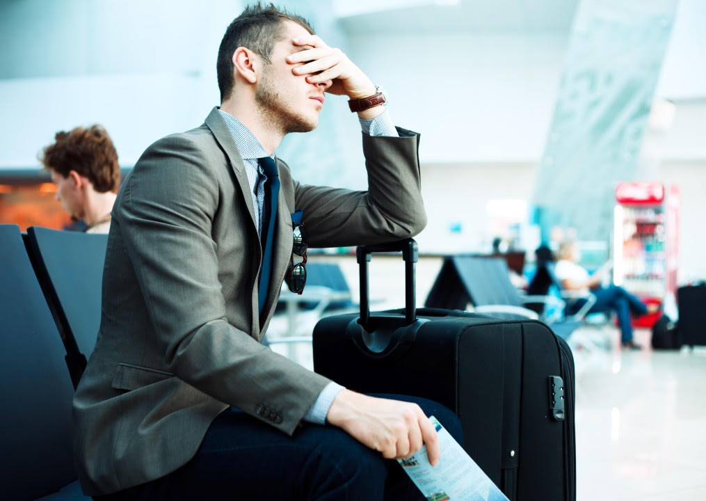Man Sitting In Airport