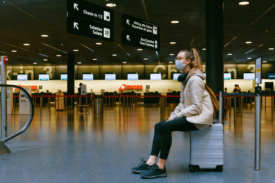 Woman Waiting At Airport